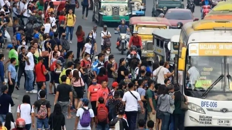 Filipino time - people waiting for transport