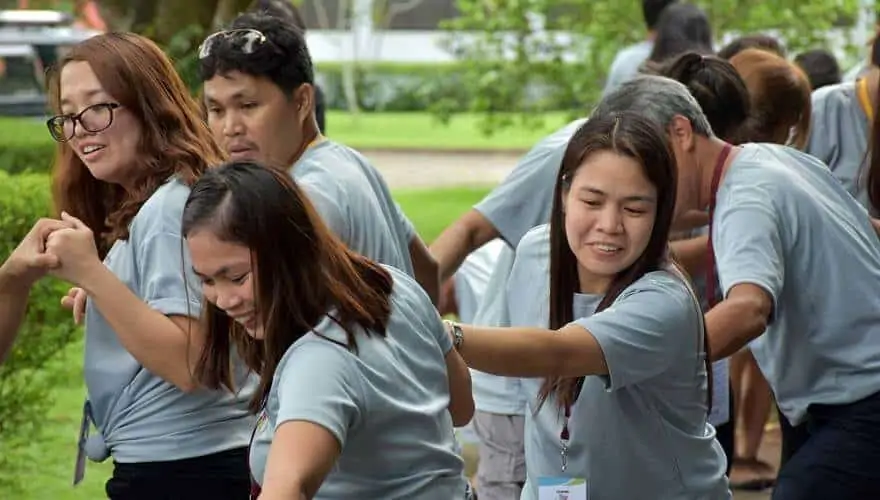 team-building-philippines-crossing-the-river team building facilitators in the Philippines make you happy