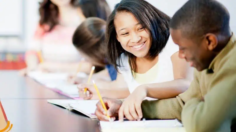 students helping each other