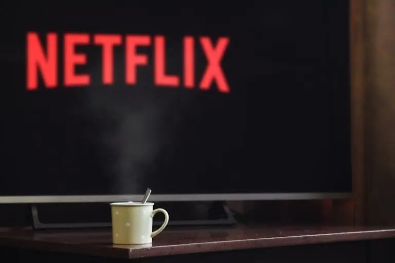 Photo of Cup Near Flat Screen Television